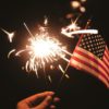 Man waving 4th July sparkler